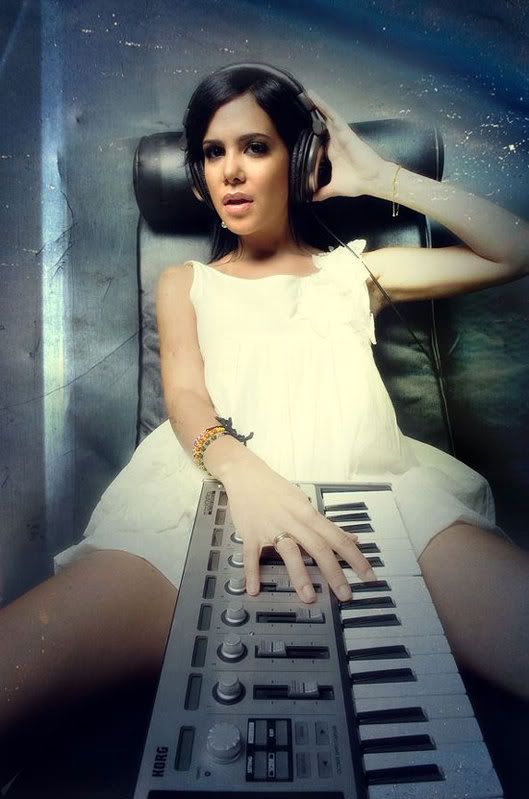 A naughty synthbabe with headphones 