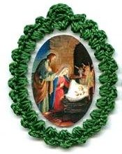 Crib scene relic badge with cloth touched to relic of the crib of Our Lord
