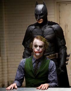 Heather Ledger as The Joker,Christian Bale as Batman